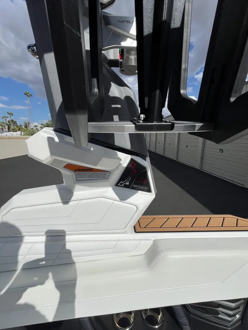 Slide: The Image of 2023 Nautique Super Air G23 boat detail with sleek design and modern features. - 85