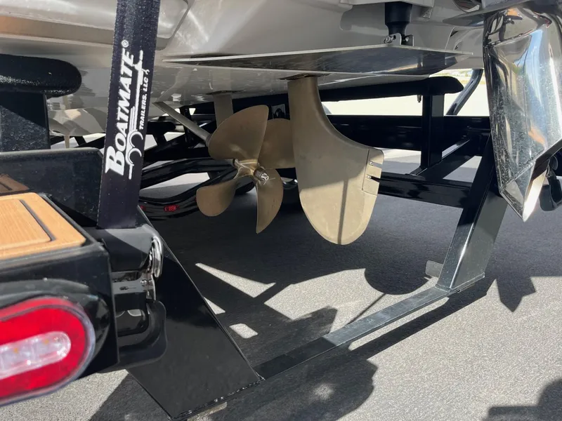 Slide: The Image of 2023 Nautique Super Air G23 boat propeller and trailer detail. - 93
