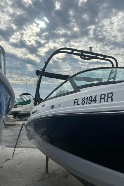 Slide: The Image of 2018 Monterey M45 boat docked under cloudy sky. - 11
