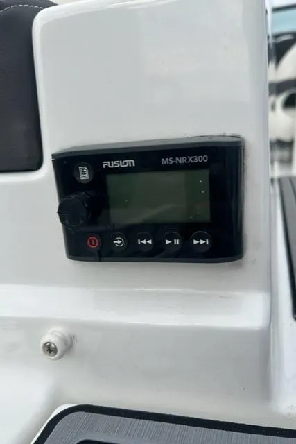 Slide: The Image of Fusion MS-NRX300 audio system on 2018 Monterey M45 boat dashboard. - 12