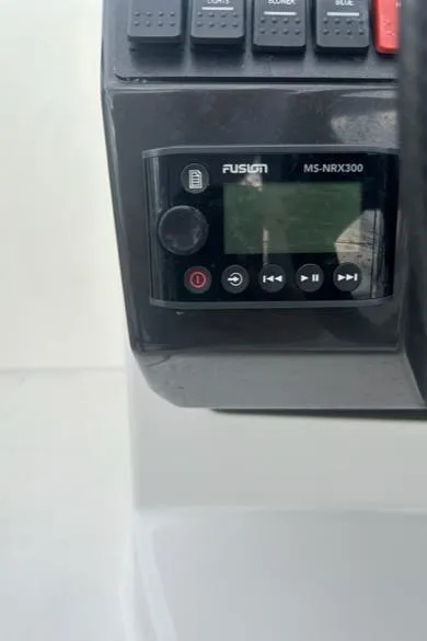 Slide: The Image of Fusion MS-NRX300 marine stereo on a 2018 Monterey M45 boat dashboard. - 19