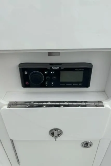 Slide: The Image of Fusion audio system on 2018 Monterey M45 boat dashboard. - 20