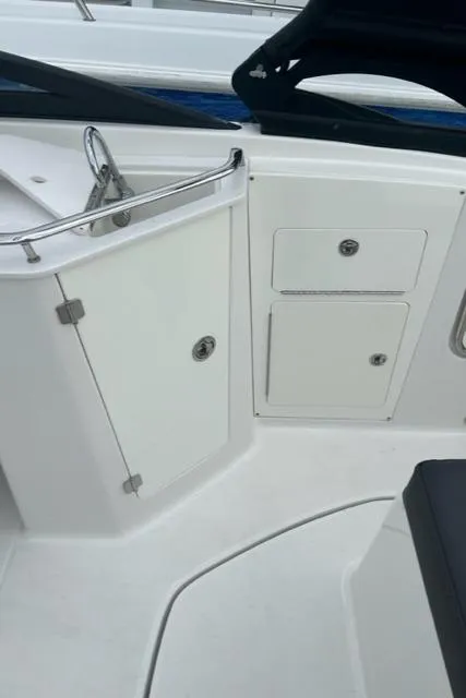 Slide: The Image of 2018 Monterey M45 boat interior with storage compartments and sleek design. - 23