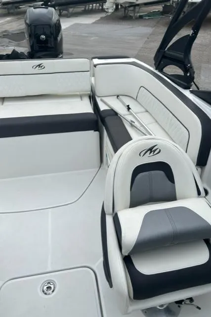 Slide: The Image of 2018 Monterey M45 boat interior with white and black seating. - 25
