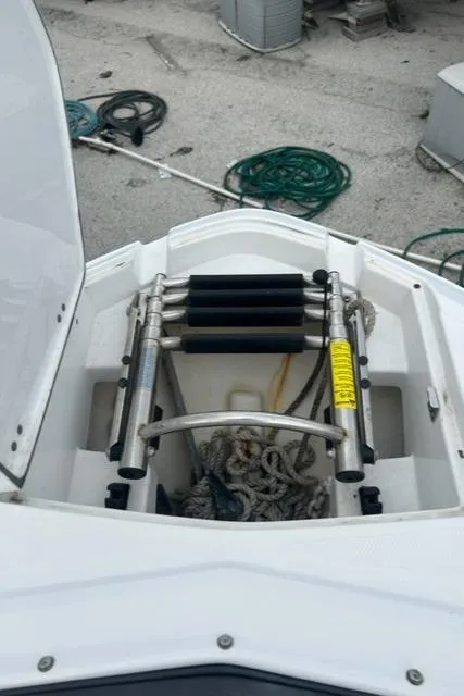 Slide: The Image of 2018 Monterey M45 boat ladder and storage compartment with ropes. - 34