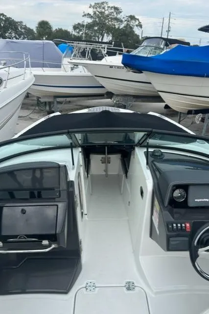 Slide: The Image of 2018 Monterey M45 boat interior with dashboard, steering wheel, and seating area. - 40