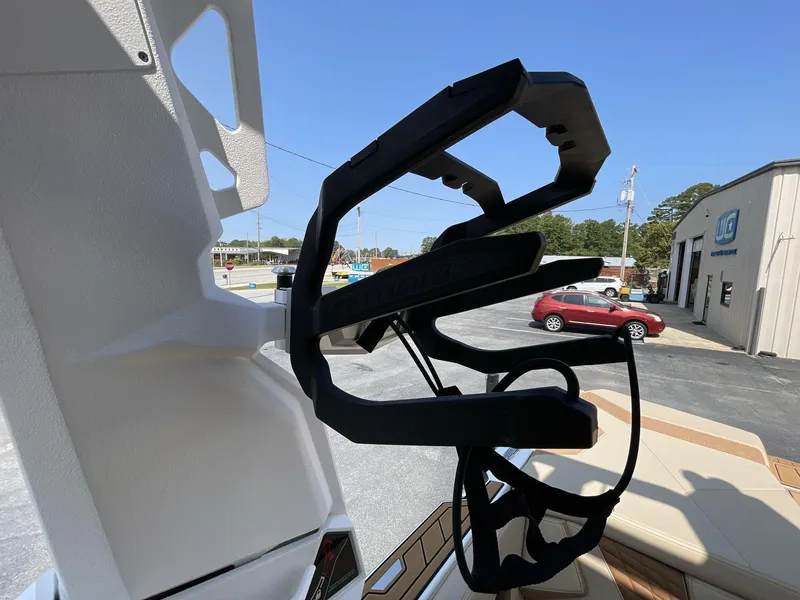 Slide: The Image of 2025 Nautique Super Air S S23 wakeboard rack in a parking lot. - 5