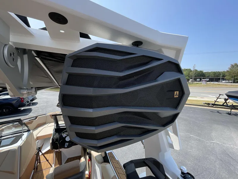 Slide: The Image of Close-up of 2025 Nautique Super Air S S23 boat speaker system. - 6