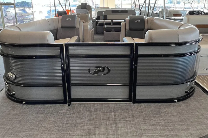 Slide: The Image of 2024 Princecraft Quorum 23 RL pontoon boat with luxurious seating and modern design. - 5