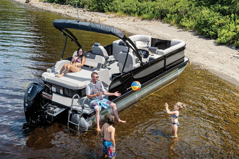 Slide: The Image of 2024 Princecraft Quorum 23 RL interior with sleek seating and table design. - 2