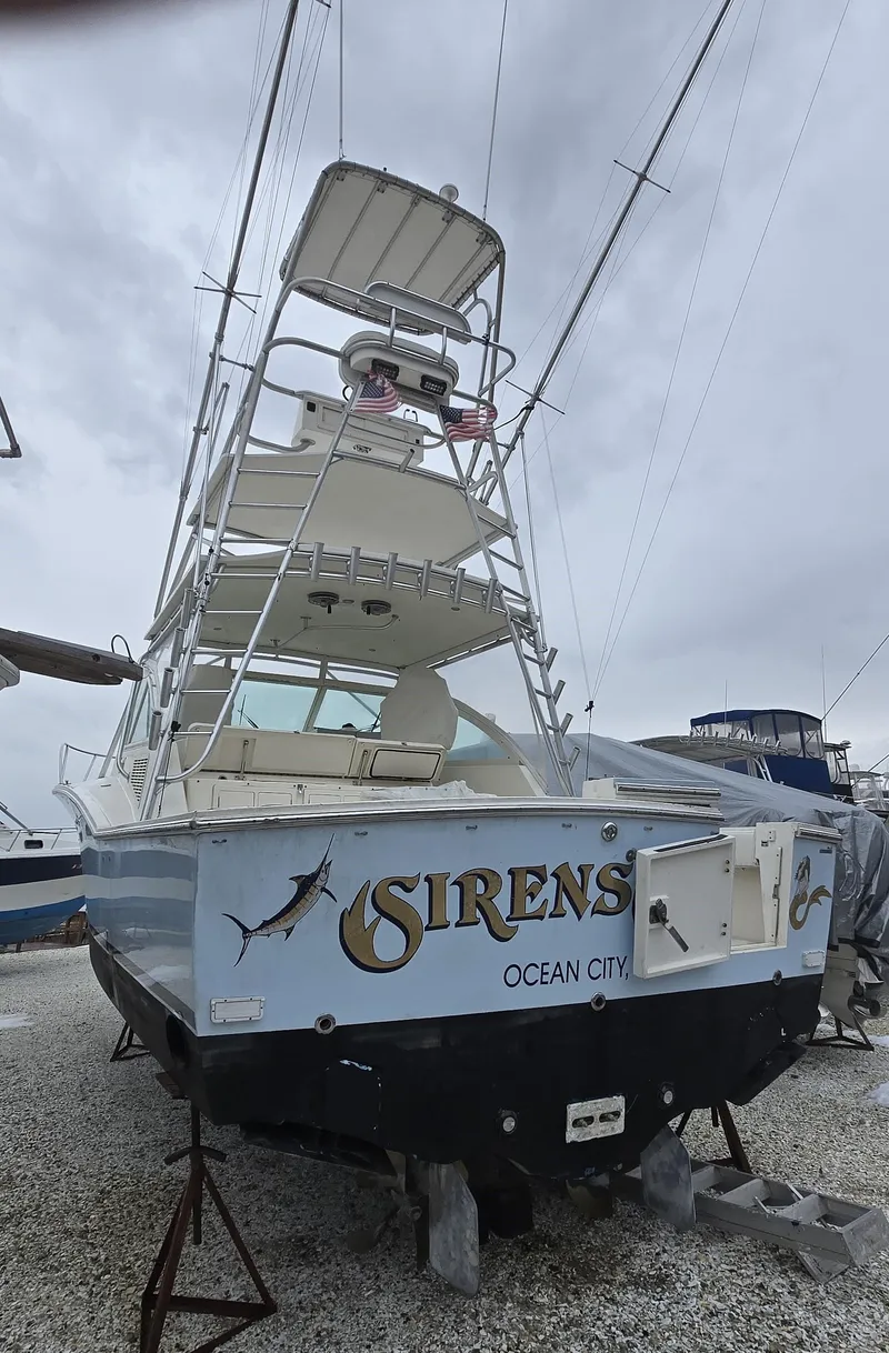 Slide: The Image of 2007 Carolina Classic 35 boat named "Sirens" in Ocean City, on dry dock. - 27