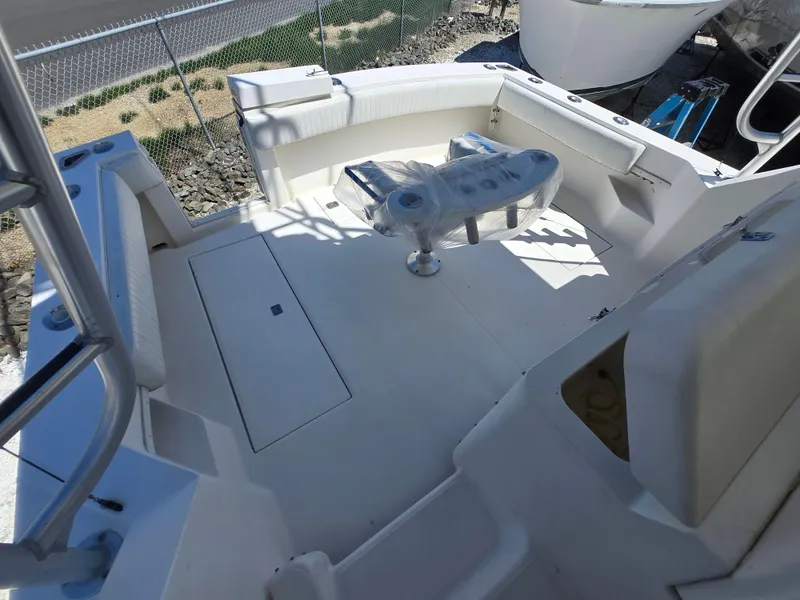 Slide: The Image of 2007 Carolina Classic 35 boat deck with seating and fishing equipment. - 38