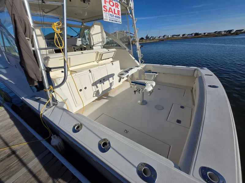 Slide: The Image of 2007 Carolina Classic 35 boat for sale, docked by the water. - 4