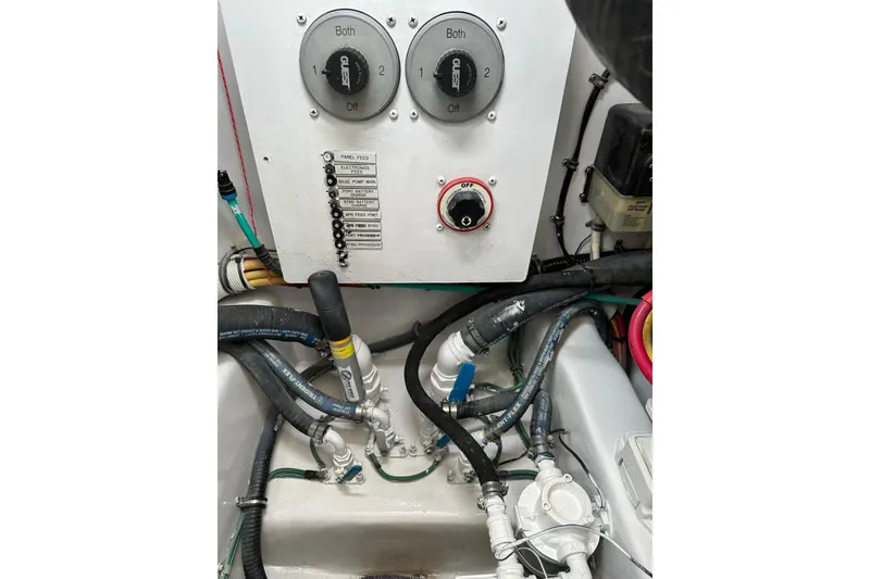 Slide: The Image of Electrical panel and wiring in a 2004 Predator 35 boat engine compartment. - 45
