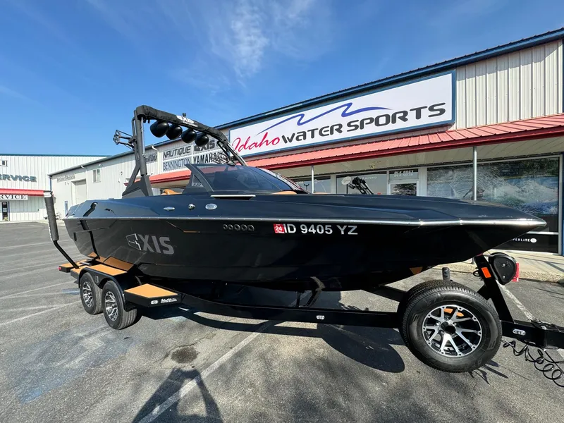 Slide: The Image of 2021 Axis A22 boat on trailer at Idaho Water Sports dealership. - 3
