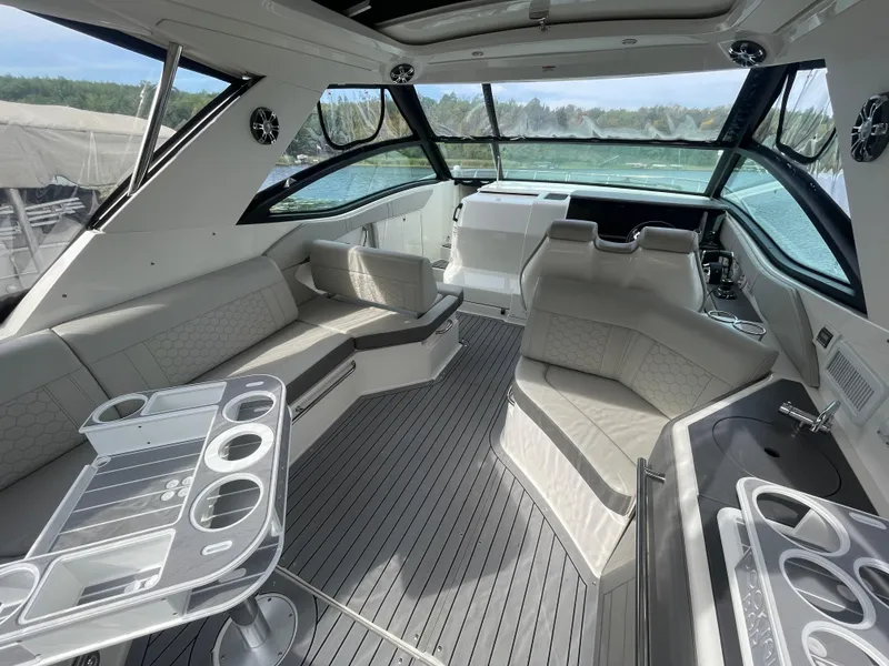 Slide: The Image of Luxurious interior of 2020 Sea Ray Sundancer 320 yacht with modern seating and sleek design. - 11