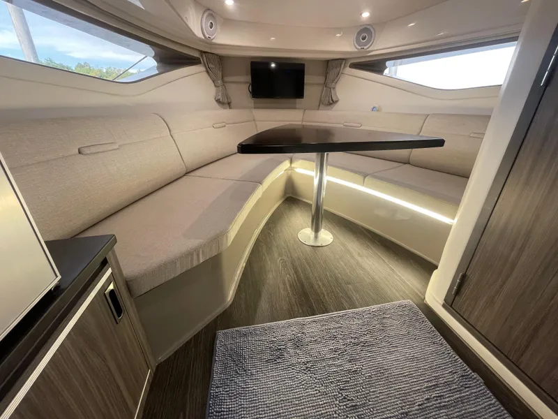 Slide: The Image of Interior of 2020 Sea Ray Sundancer 320 with elegant seating and modern design. - 26