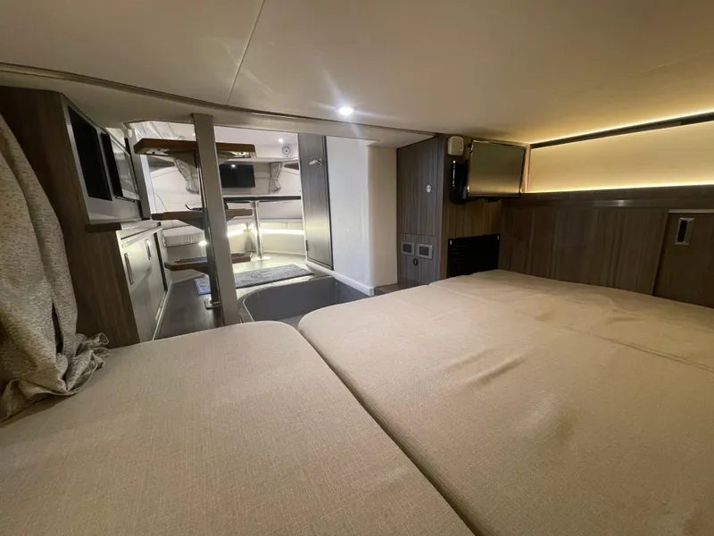 Slide: The Image of Interior of 2020 Sea Ray Sundancer 320 yacht, featuring cozy cabin and modern amenities. - 28