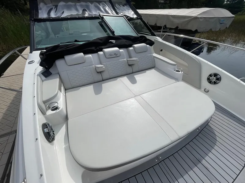 Slide: The Image of 2020 Sea Ray Sundancer 320 boat with spacious sun deck and luxurious seating. - 31
