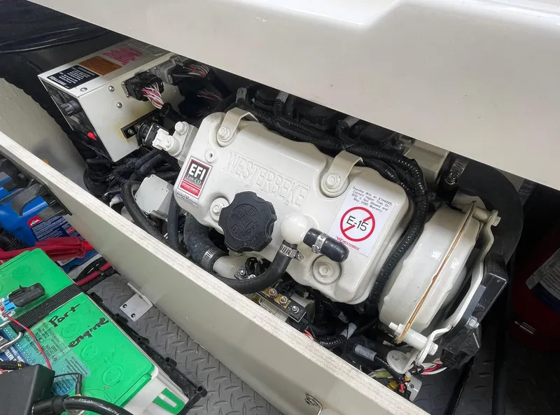 Slide: The Image of Engine compartment of 2020 Sea Ray Sundancer 320, featuring EFI system and components. - 37