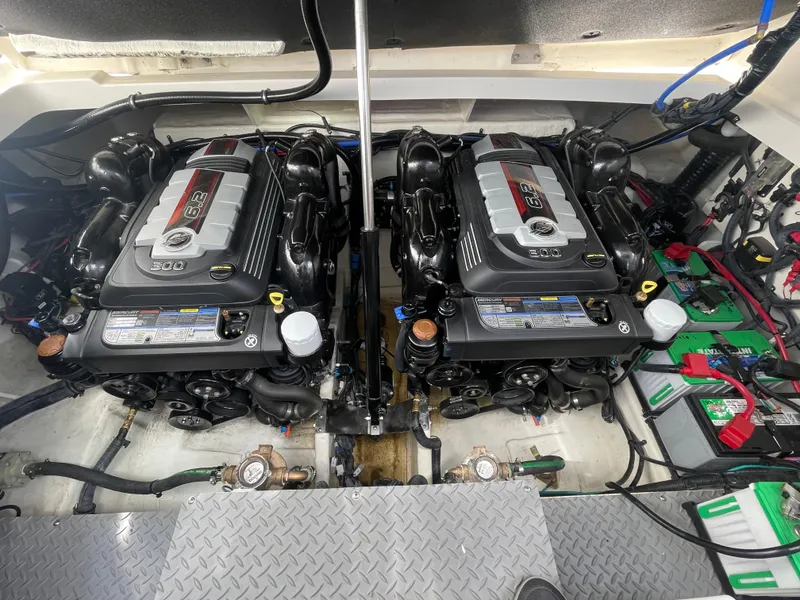 Slide: The Image of Twin engines in a 2020 Sea Ray Sundancer 320 boat engine room. - 39