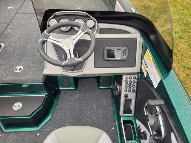 Slide: The Image of 2024 Ranger 2080MS boat dashboard with steering wheel and control panel. - 3