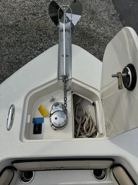 Slide: The Image of 2022 Sea Chaser 22 HFC boat anchor compartment with chain and rope storage. - 15