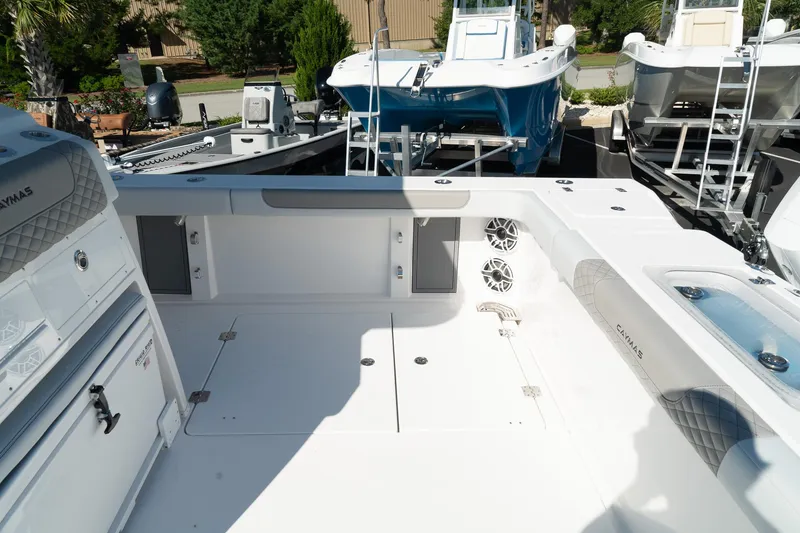 Slide: The Image of 2025 Caymas 34 CT boat interior with spacious deck and storage compartments. - 15