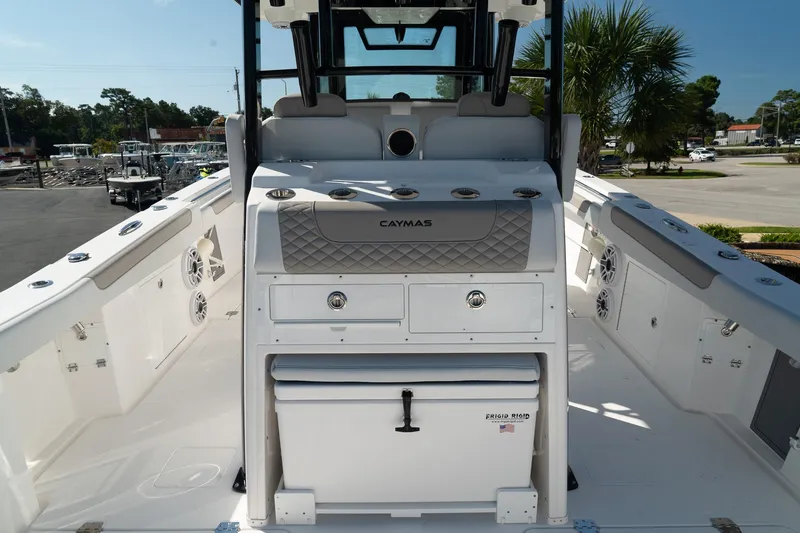Slide: The Image of 2025 Caymas 34 CT boat interior with storage and seating, featuring sleek design and modern amenities. - 16
