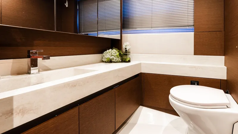 Slide: The Image of Luxurious bathroom in 2019 Prestige 520 Flybridge yacht with modern fixtures and elegant design. - 24