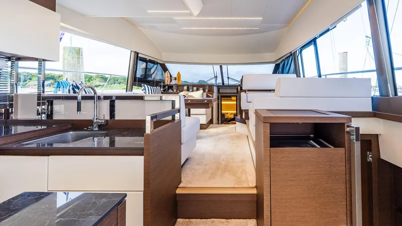 Slide: The Image of Luxurious interior of 2019 Prestige 520 Flybridge yacht with modern design and spacious layout. - 6