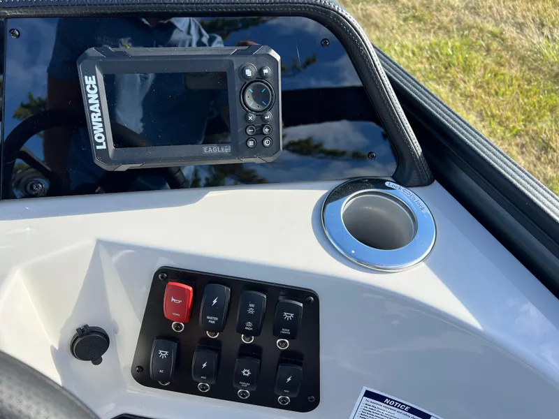 Slide: The Image of Control panel of 2025 Crest CLASSIC 220 SLC boat with Lowrance device. - 25
