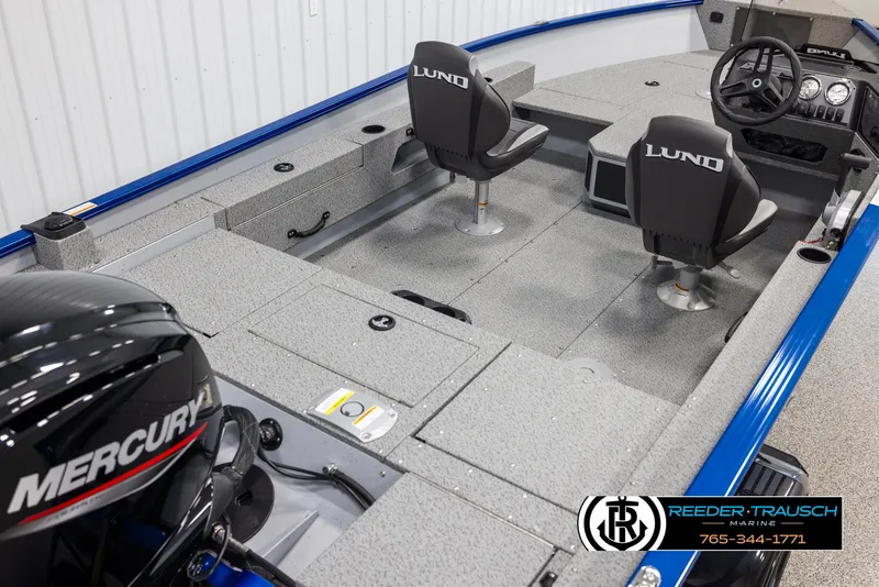 Slide: The Image of 2025 Lund 1775 Adventure SS boat interior with Mercury engine, featuring two seats and steering console. - 10