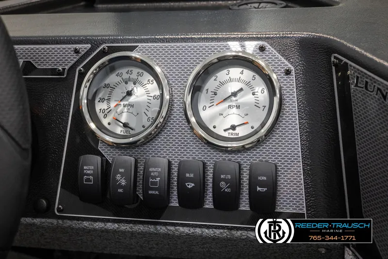 Slide: The Image of Dashboard of 2025 Lund 1775 Adventure SS boat with speedometer and RPM gauges. - 21