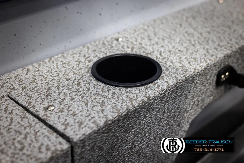 Slide: The Image of 2025 Lund 1775 Adventure SS boat detail with textured surface and cup holder. - 25