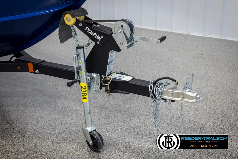 Slide: The Image of Trailer hitch of 2025 Lund 1775 Adventure SS boat, featuring secure chains and wheel jack. - 36