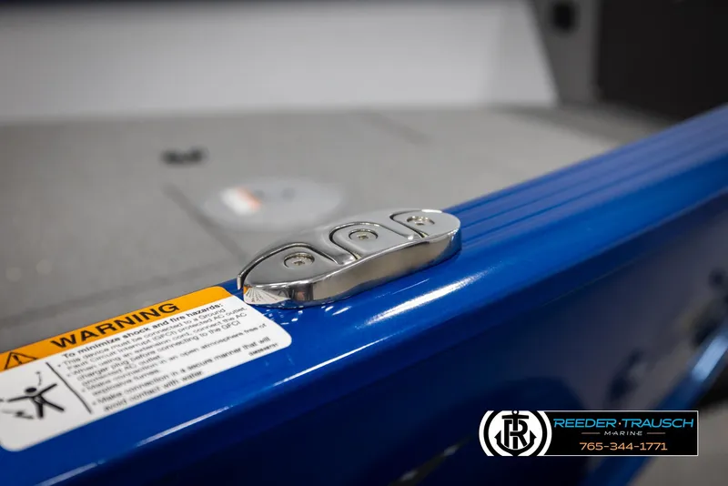 Slide: The Image of 2025 Lund 1775 Adventure SS boat detail with warning label and metal fixture. - 40