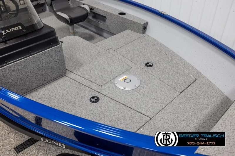 Slide: The Image of 2025 Lund 1775 Adventure SS boat interior with gray deck and blue trim. - 7