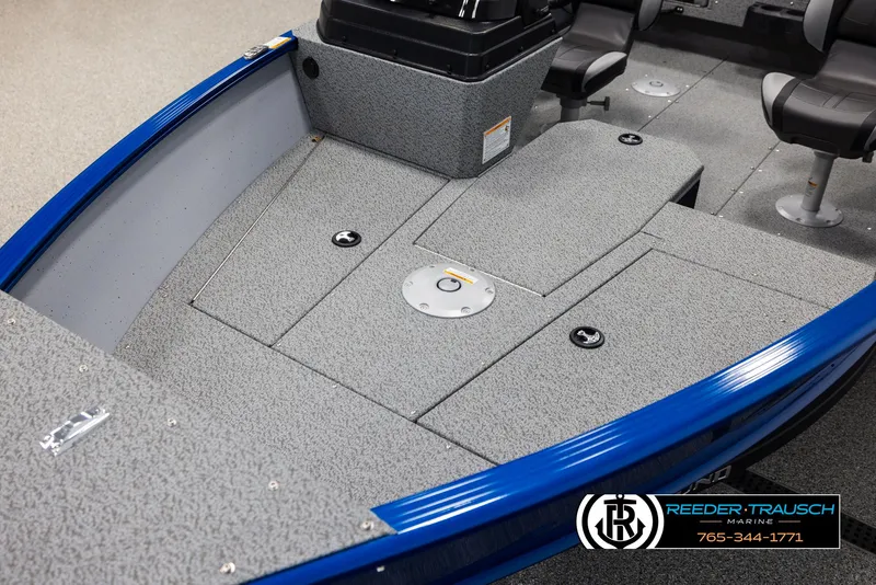Slide: The Image of 2025 Lund 1775 Adventure SS boat interior with gray deck and blue trim. - 8