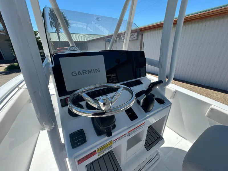 Slide: The Image of 2025 Sea Hunt Ultra 229 boat console with Garmin navigation system. - 12