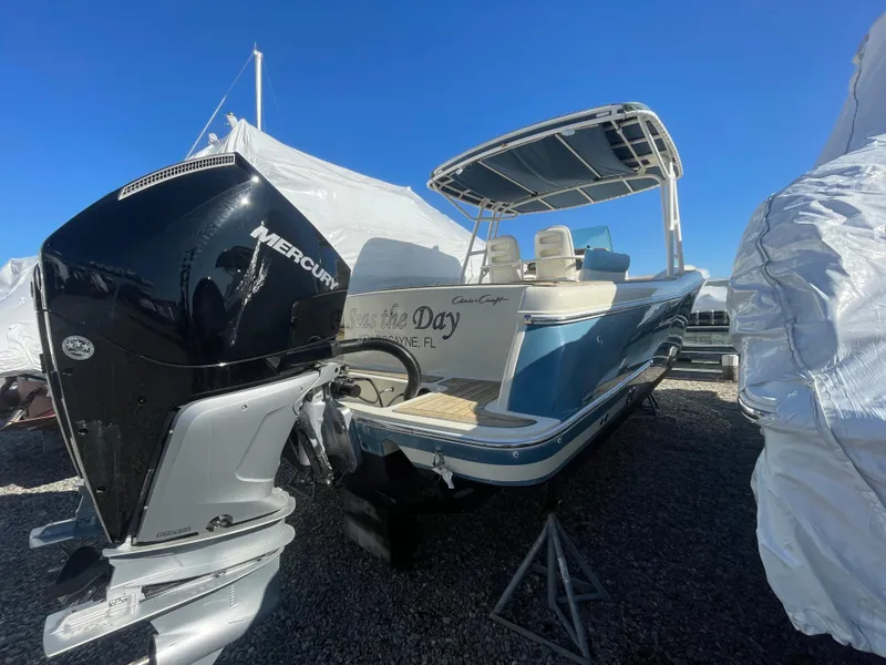 Slide: The Image of 2011 Chris-Craft Catalina 29 Sun Tender with Mercury engine, parked outdoors. - 10