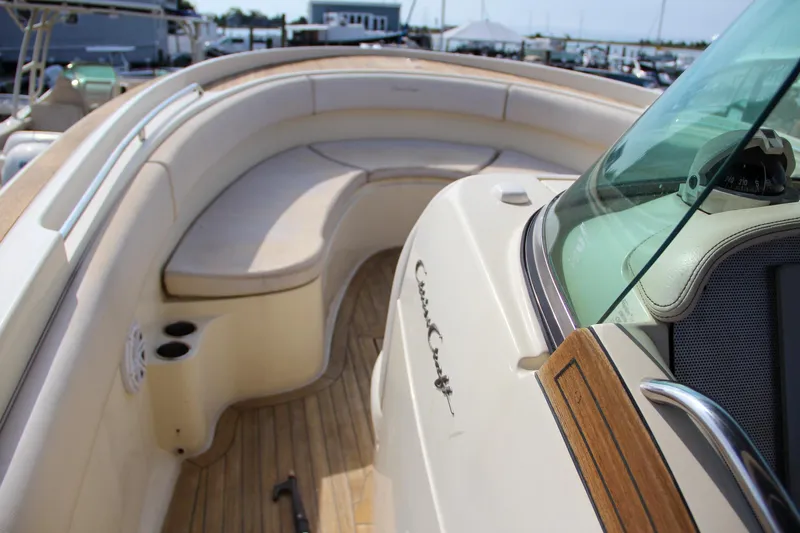 Slide: The Image of 2011 Chris-Craft Catalina 29 Sun Tender with elegant seating and teak accents. - 15
