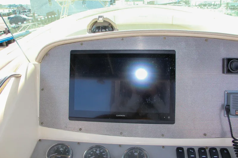 Slide: The Image of Dashboard of 2011 Chris-Craft Catalina 29 Sun Tender with Garmin display. - 26