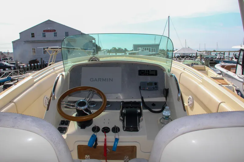 Slide: The Image of 2011 Chris-Craft Catalina 29 Sun Tender helm with Garmin navigation system. - 6