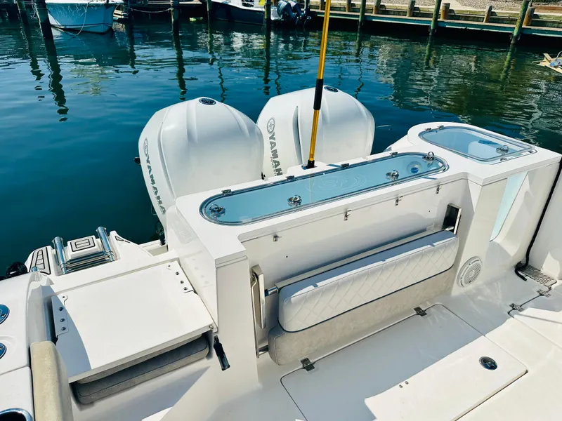 Slide: The Image of 2019 Sea Fox 328 Commander boat with Yamaha engines docked at marina. - 9