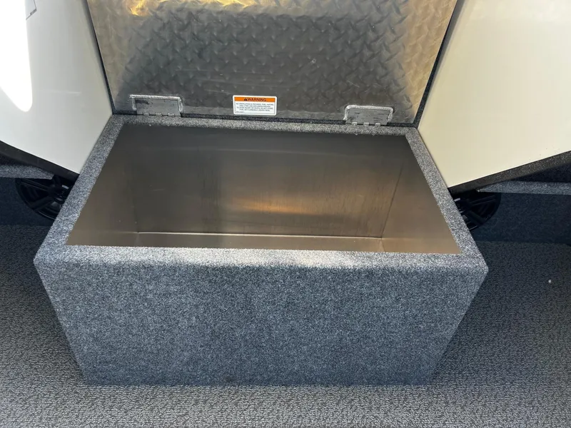 Slide: The Image of Storage compartment in 2024 Thunder Jet 26 Alexis Pro XL boat, featuring a durable interior. - 14