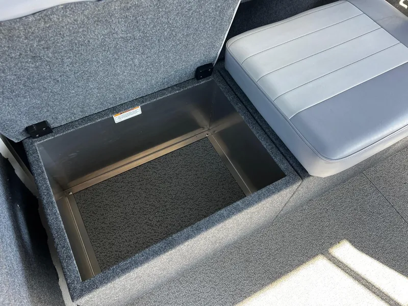 Slide: The Image of Storage compartment in 2024 Thunder Jet 26 Alexis Pro XL boat interior. - 21