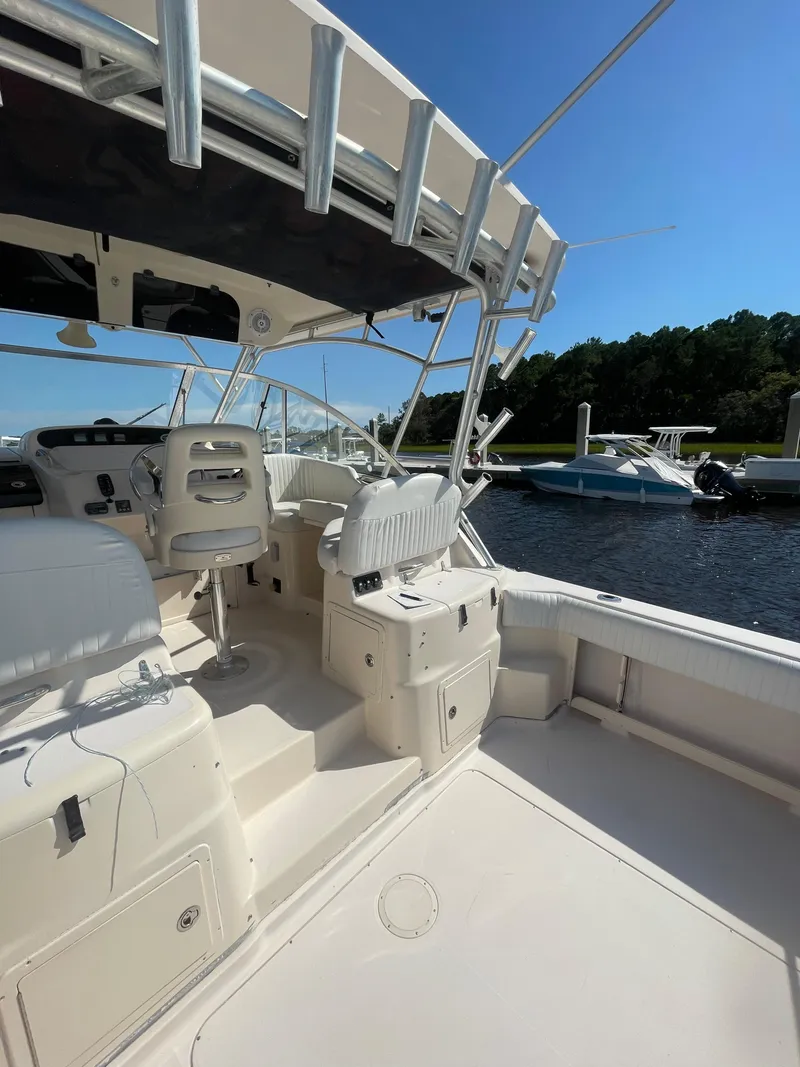 Slide: The Image of 2008 Grady-White Open Express boat interior, docked on a sunny day. - 10