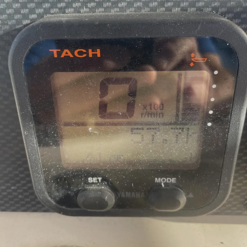 Slide: The Image of Tachometer display on 2008 Grady-White Open Express boat, showing zero RPM. - 16