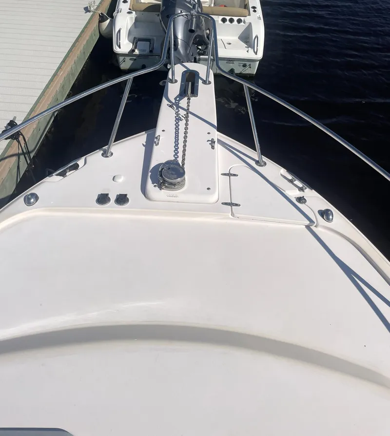 Slide: The Image of 2008 Grady-White Open Express boat docked at marina. - 5